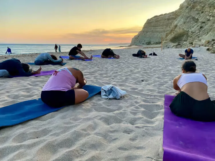 Yoga practice on the beach during the Lagos coastal hike.