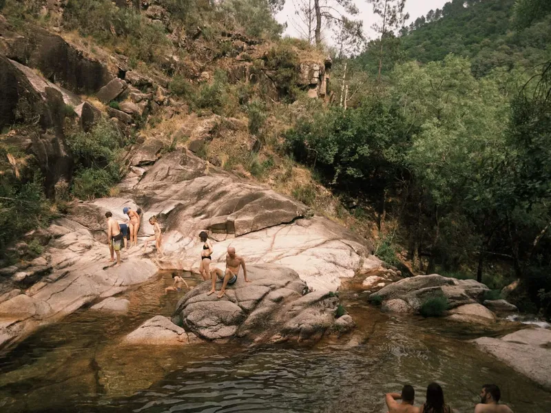 A lush, green landscape in Peneda-Gerês National Park featuring clear skies and untouched nature.